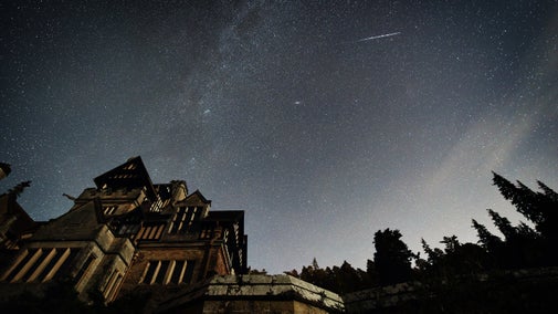 Starry night sky over Cragside, Northumberland